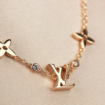 ¡®AuraJewelry¡¯STAR AND SUN 7 MOTIFS GOLD BRACELET