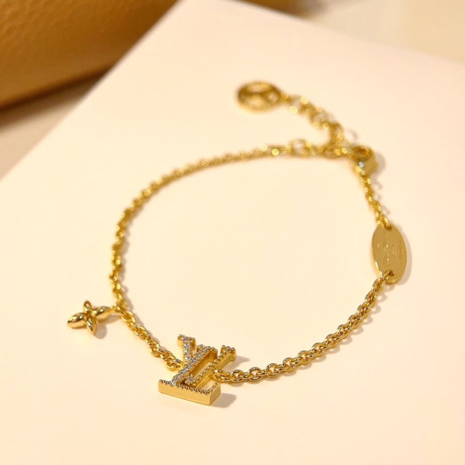 ¡®AuraJewelry¡¯LOGO STAR MOTIF GOLD BRACELET