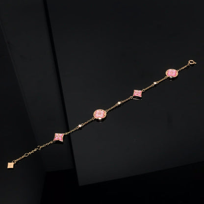 「オーラジュエリー」スターアンドサン 4モチーフ ピンクMOP ピンクゴールドブレスレット