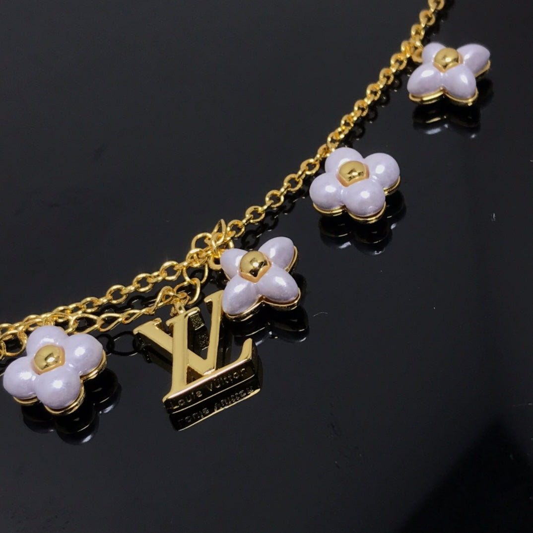 ¡®AuraJewelry¡¯LOGO 6 MOTIF STAR AND SUN GOLD BRACELET