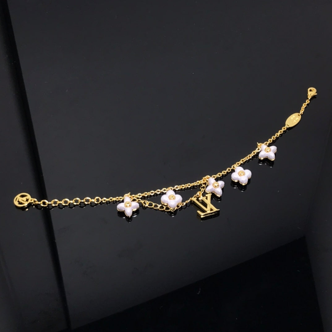 ¡®AuraJewelry¡¯LOGO 6 MOTIF STAR AND SUN GOLD BRACELET