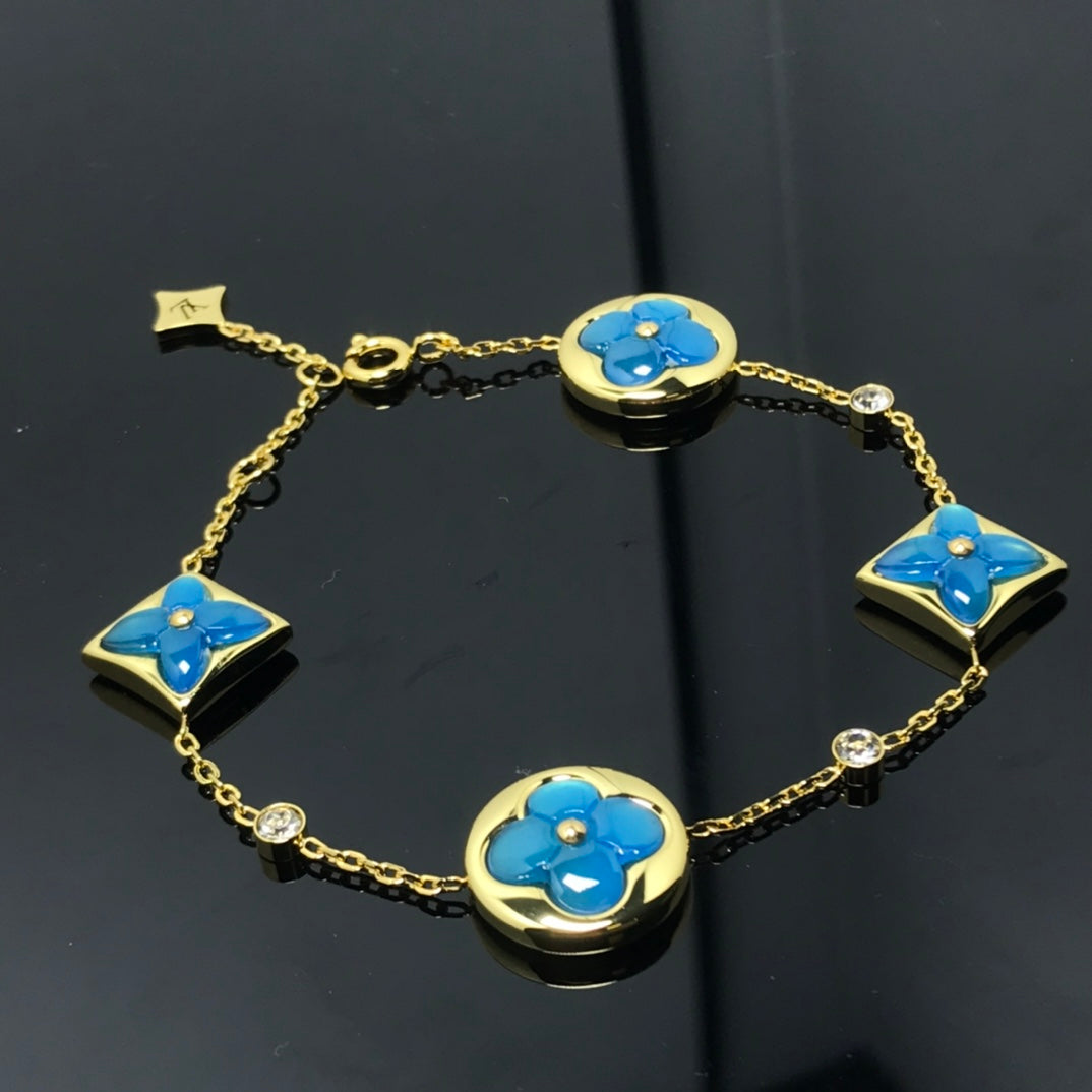 ¡®AuraJewelry¡¯STAR AND SUN 4 MOTIF BLUE BRACELET