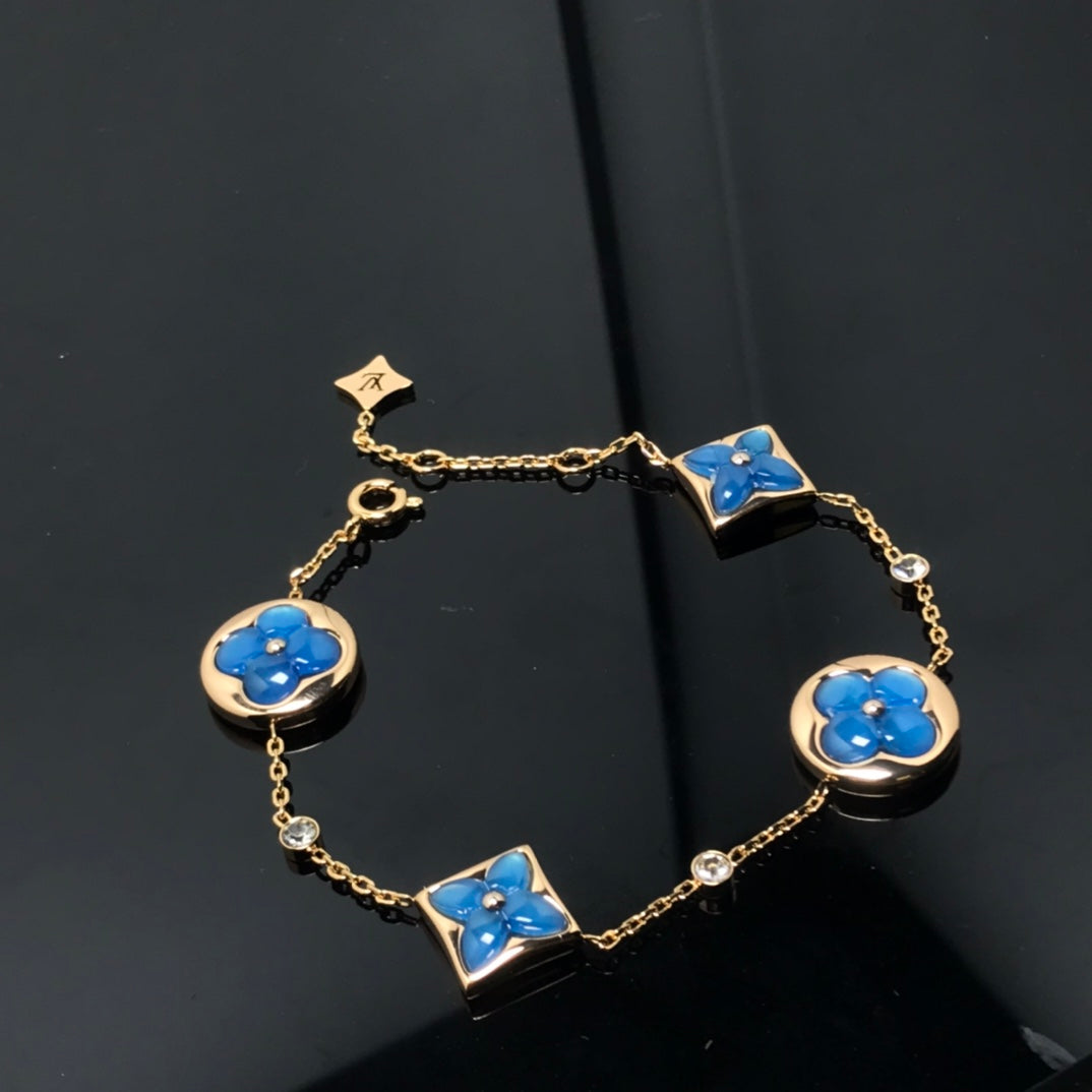 ¡®AuraJewelry¡¯STAR AND SUN 4 MOTIF BLUE BRACELET